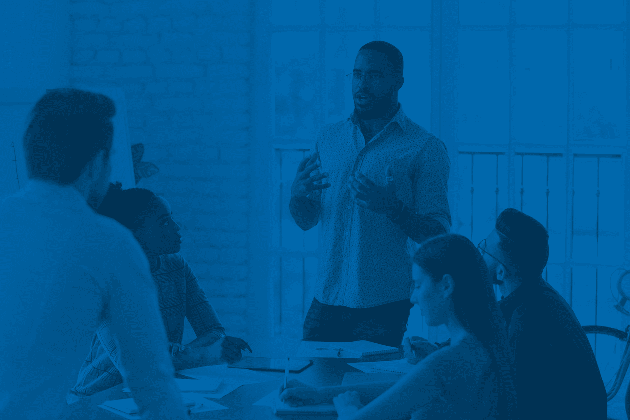 Leader communicating to employees critical news