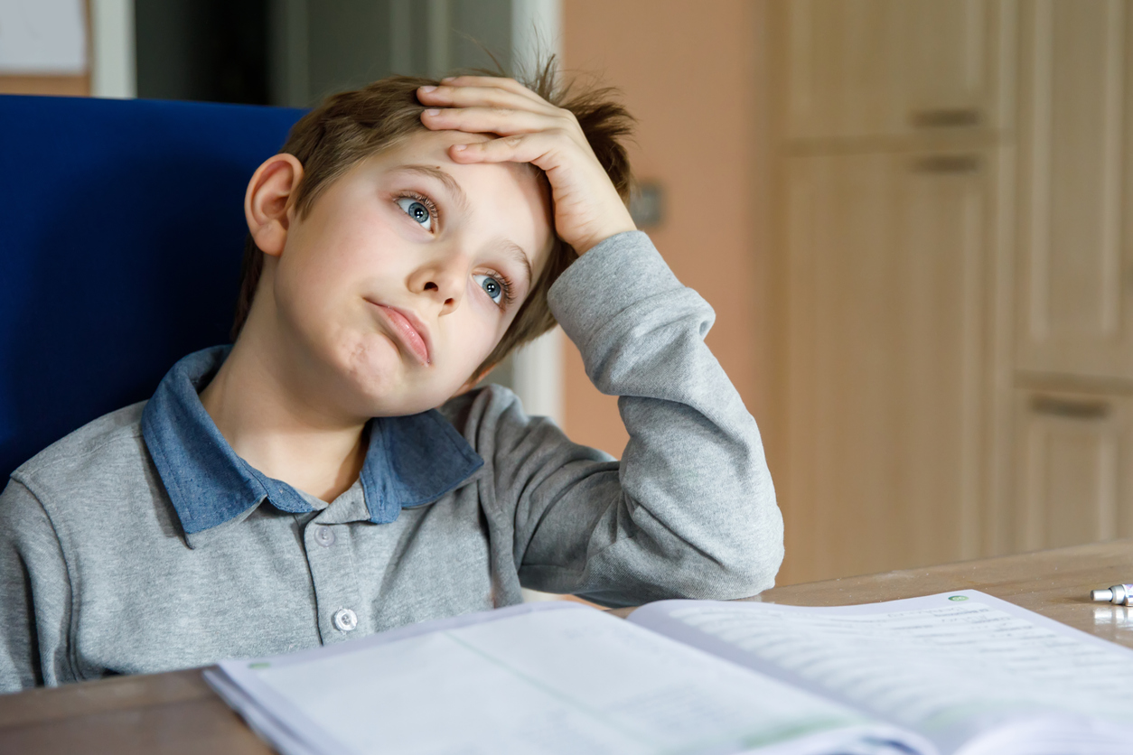 frustrated student working on homework